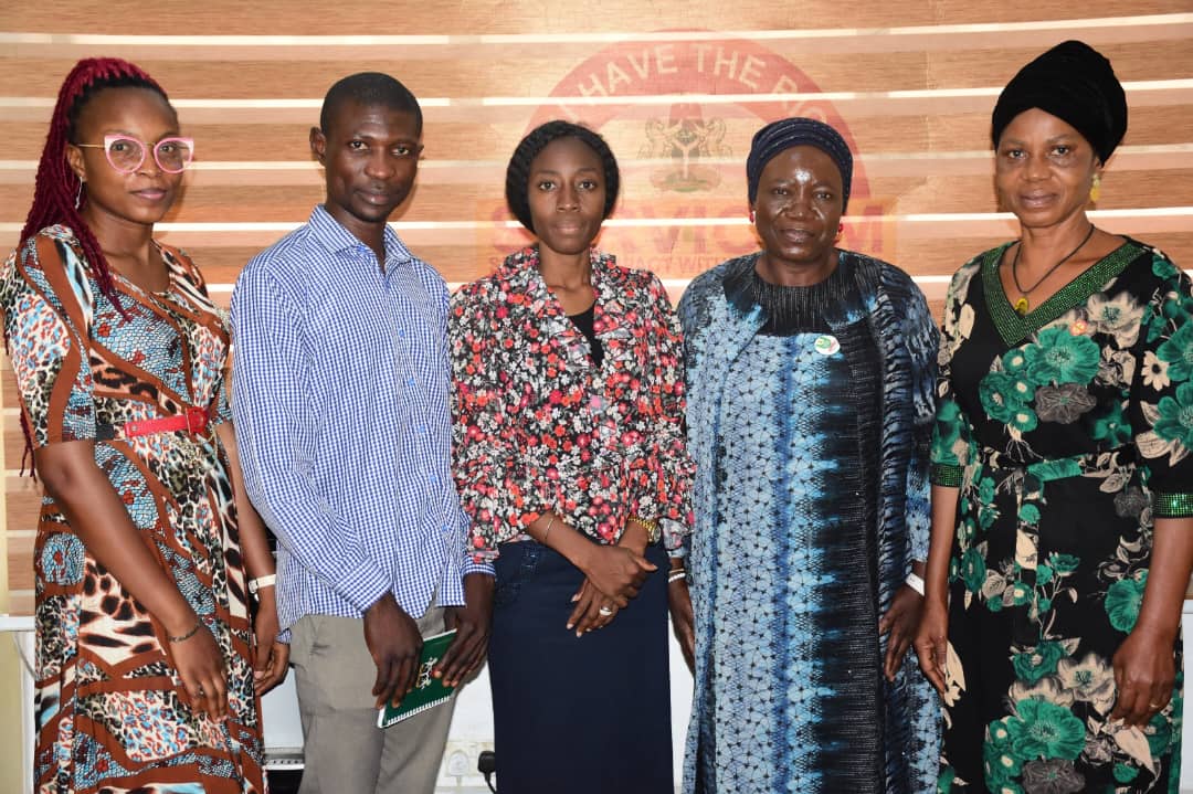 Group-photograph-with-Team-C-Lead-at-the-Induction-of-Nodal-Officer-NOUN